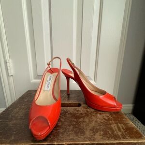 Orange open toe strap heels